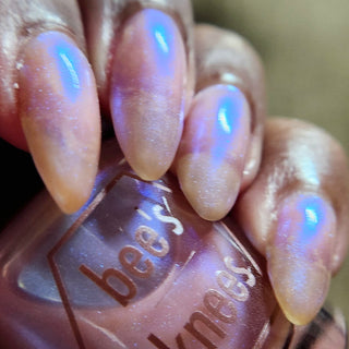 Image provided for Bee's Knees by a paid swatcher featuring the nail polish " Through Love, All is Possible "