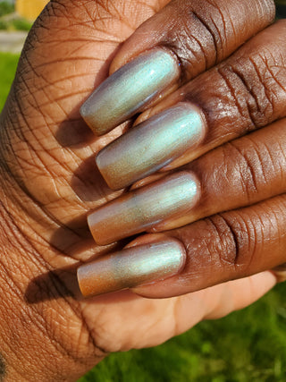 Image provided for Bee's Knees by a paid swatcher featuring the nail polish " Torrent "