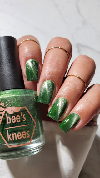 Image provided for Bee's Knees by a paid swatcher featuring the nail polish " Believing Something does not Make it True "