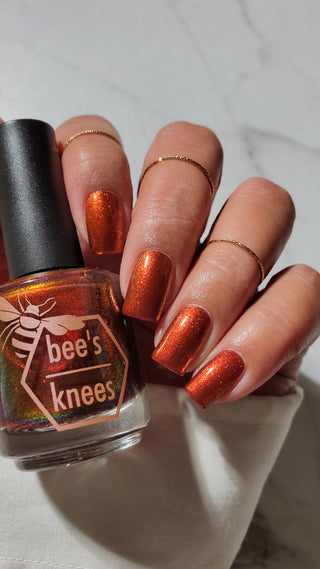 Image provided for Bee's Knees by a paid swatcher featuring the nail polish " The Dark Angel "
