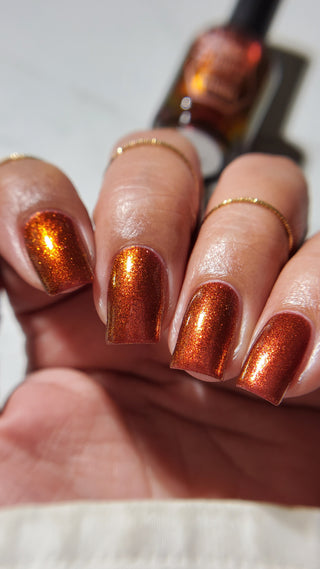 Image provided for Bee's Knees by a paid swatcher featuring the nail polish " The Dark Angel "