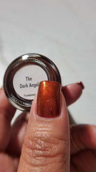 Image provided for Bee's Knees by a paid swatcher featuring the nail polish " The Dark Angel "