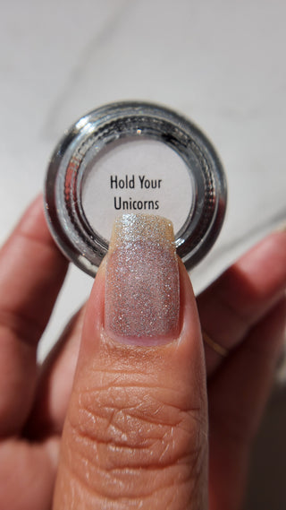 Image provided for Bee's Knees by a paid swatcher featuring the nail polish " Hold Your Unicorns "