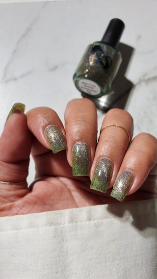 Image provided for Bee's Knees by a paid swatcher featuring the nail polish " What's a Little Blackmail Between Friends "