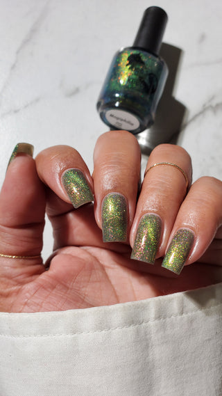 Image provided for Bee's Knees by a paid swatcher featuring the nail polish " Magiphilia "