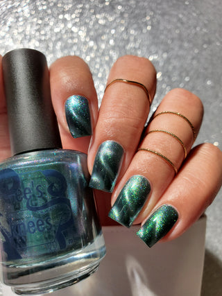 Image provided for Bee's Knees by a paid swatcher featuring the nail polish " Midnight Yoga and Seaweed "