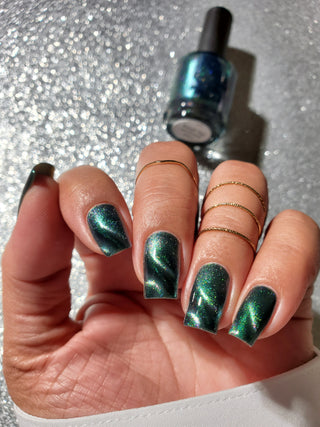 Image provided for Bee's Knees by a paid swatcher featuring the nail polish " Midnight Yoga and Seaweed "