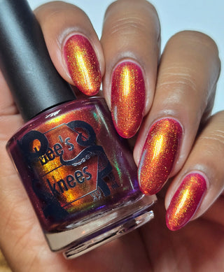 Image provided for Bee's Knees by a paid swatcher featuring the nail polish " The Bar is in Hell "