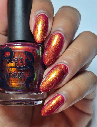 Image provided for Bee's Knees by a paid swatcher featuring the nail polish " The Bar is in Hell "