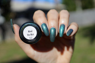 Image provided for Bee's Knees by a paid swatcher featuring the nail polish " Mind the Mist "