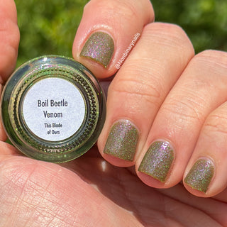 Image provided for Bee's Knees by a paid swatcher featuring the nail polish " Boil Beetle Venom "