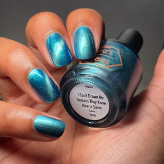 Image provided for Bee's Knees by a paid swatcher featuring the nail polish " I Can't Drown my Demons they Know How to Swim "