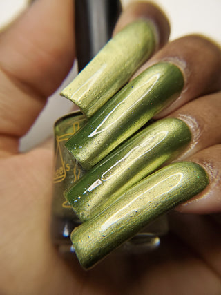 Image provided for Bee's Knees by a paid swatcher featuring the nail polish " Coercer "
