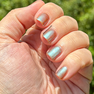 Image provided for Bee's Knees by a paid swatcher featuring the nail polish " Torrent "