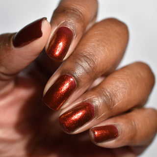 Image provided for Bee's Knees by a paid swatcher featuring the nail polish " The Dark Angel "