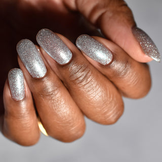 Image provided for Bee's Knees by a paid swatcher featuring the nail polish " Hold Your Unicorns "