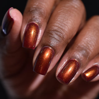 Image provided for Bee's Knees by a paid swatcher featuring the nail polish " The Bar is in Hell "