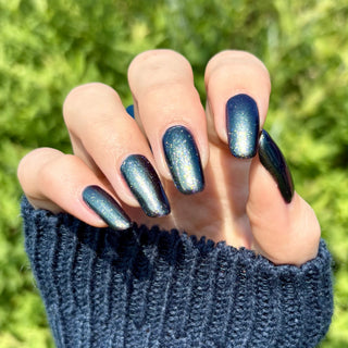Image provided for Bee's Knees by a paid swatcher featuring the nail polish " An Insane F🦑cking Tentacle Sanctuary "