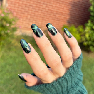 Image provided for Bee's Knees by a paid swatcher featuring the nail polish " Midnight Yoga and Seaweed "