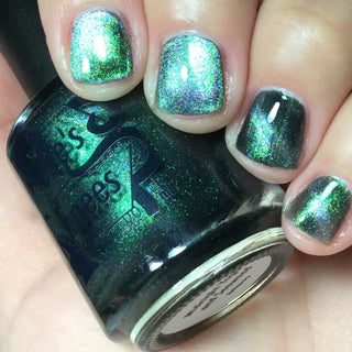 Image provided for Bee's Knees by a paid swatcher featuring the nail polish " Midnight Yoga and Seaweed "