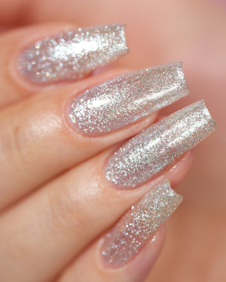 Image provided for Bee's Knees by a paid swatcher featuring the nail polish " Hold Your Unicorns "