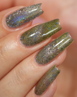 Image provided for Bee's Knees by a paid swatcher featuring the nail polish " What's a Little Blackmail Between Friends "