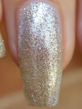 Image provided for Bee's Knees by a paid swatcher featuring the nail polish " Hold Your Unicorns "