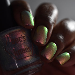 Image provided for Bee's Knees by a paid swatcher featuring the nail polish " The Archer's Curse "