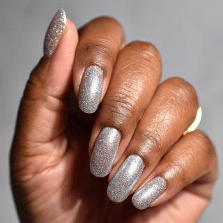 Image provided for Bee's Knees by a paid swatcher featuring the nail polish " Hold Your Unicorns "