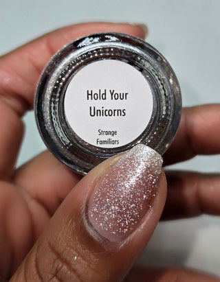 Image provided for Bee's Knees by a paid swatcher featuring the nail polish " Hold Your Unicorns "