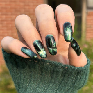 Image provided for Bee's Knees by a paid swatcher featuring the nail polish " Midnight Yoga and Seaweed "