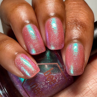 Image provided for Bee's Knees by a paid swatcher featuring the nail polish " Mirage "