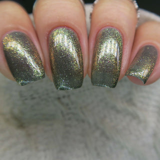 Image provided for Bee's Knees by a paid swatcher featuring the nail polish " Denial "