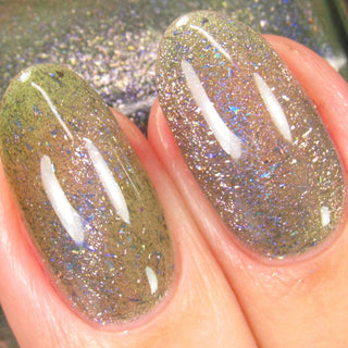 Image provided for Bee's Knees by a paid swatcher featuring the nail polish " What's a Little Blackmail Between Friends "