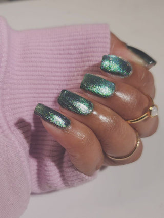 Image provided for Bee's Knees by a paid swatcher featuring the nail polish " Midnight Yoga and Seaweed "