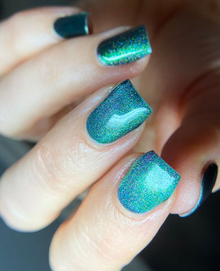 Image provided for Bee's Knees by a paid swatcher featuring the nail polish " Midnight Yoga and Seaweed "