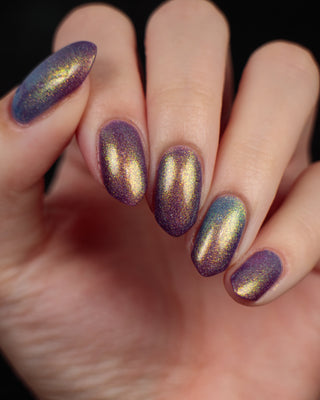 Image provided for Bee's Knees by a paid swatcher featuring the nail polish " Let the Ocean Take Me "