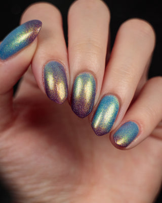Image provided for Bee's Knees by a paid swatcher featuring the nail polish " Let the Ocean Take Me "