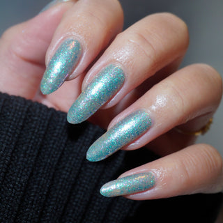 Image provided for Bee's Knees by a paid swatcher featuring the nail polish " Heartbreak "