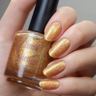 Image provided for Bee's Knees by a paid swatcher featuring the nail polish " The Golden Path "