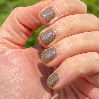 Image provided for Bee's Knees by a paid swatcher featuring the nail polish " Boil Beetle Venom "