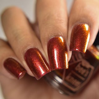 Image provided for Bee's Knees by a paid swatcher featuring the nail polish " The Dark Angel "