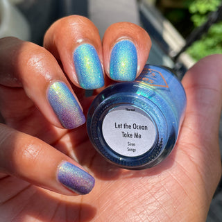 Image provided for Bee's Knees by a paid swatcher featuring the nail polish " Let the Ocean Take Me "