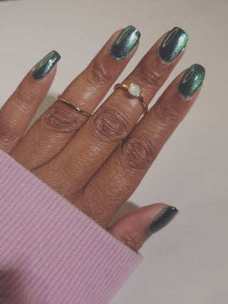 Image provided for Bee's Knees by a paid swatcher featuring the nail polish " Midnight Yoga and Seaweed "