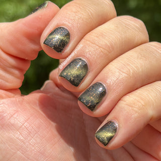 Image provided for Bee's Knees by a paid swatcher featuring the nail polish " Stormfall "