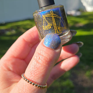 Image provided for Bee's Knees by a paid swatcher featuring the nail polish " Every Accusation is Always a Confession "