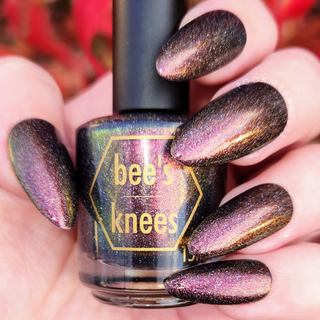 Image provided for Bee's Knees by a paid swatcher featuring the nail polish " The Black Horse "