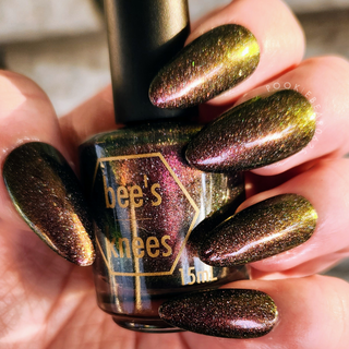 Image provided for Bee's Knees by a paid swatcher featuring the nail polish " The Black Horse "