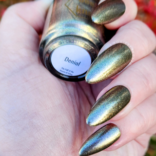 Image provided for Bee's Knees by a paid swatcher featuring the nail polish " Denial "