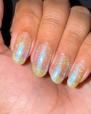 Image provided for Bee's Knees by a paid swatcher featuring the nail polish " All Bite "